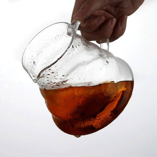 "Disfruta de una extracción de café consistente y deliciosa con nuestro servidor transparente."