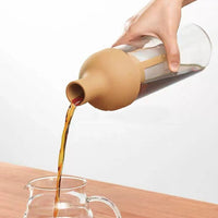 Preparación de Tisanas: Sumérgete en el mundo de las tisanas con nuestra cafetera. Las hierbas y flores se infunden perfectamente en el colador, ofreciéndote tisanas frescas y aromáticas.