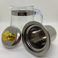Tetera de Vidrio Duradero: Fabricada con vidrio de borosilicato resistente al calor y a golpes para una durabilidad excepcional.